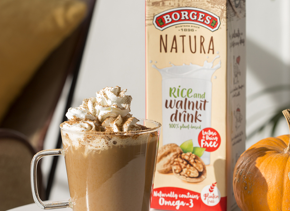 Pumpkin spice latte cup with nuts drink