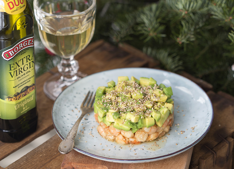 Avocado and prawn tartare served in a white dish with Borges olive oil