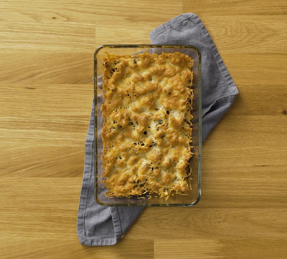Mushroom and chicken au gratin served in an oven tray