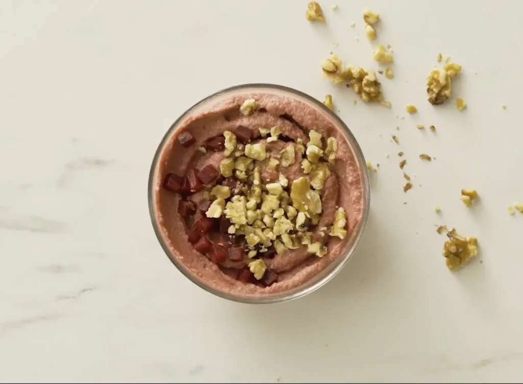 Beet hummus with nuts topping