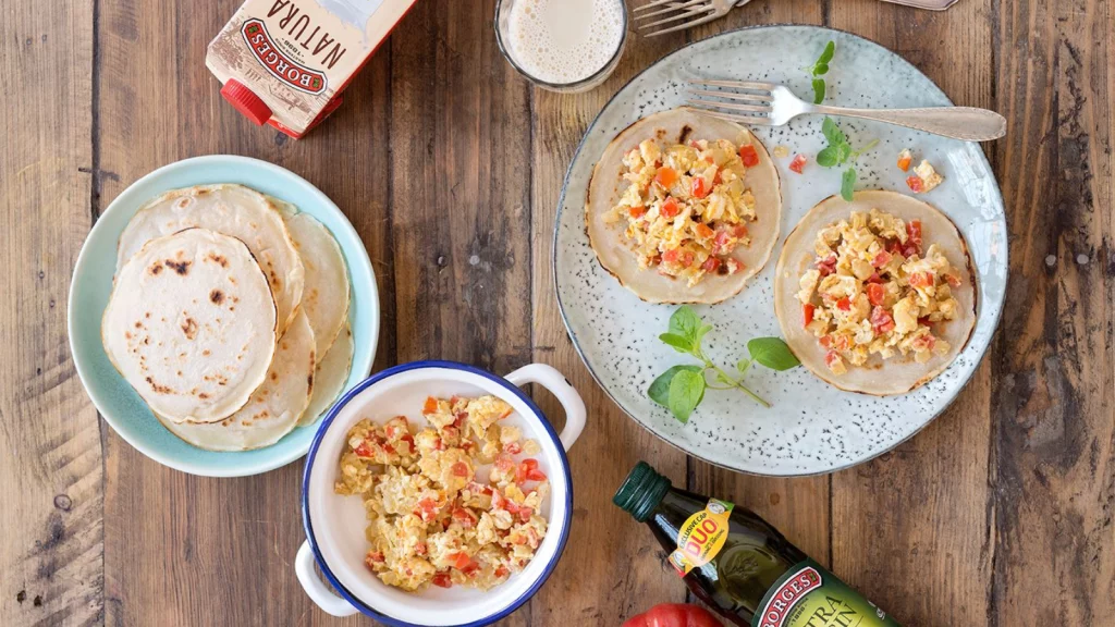 Vegetables and egg breakfast tacos with tortillas
