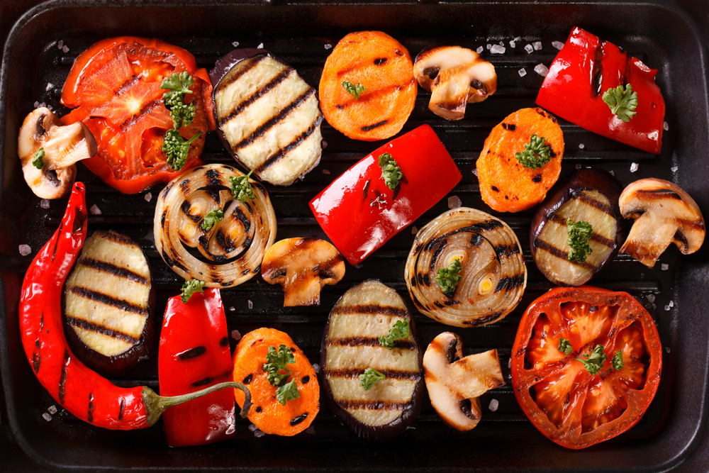 Grilled vegetables such as tomatoes, carrots, mushrooms, courgettes
