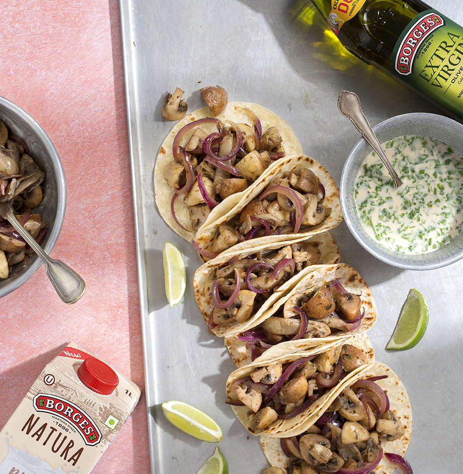 Mushroom tacos recipe served with lime and sauce